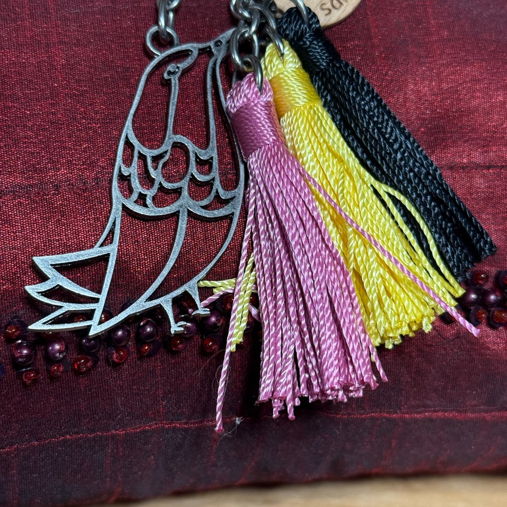 Sakroots Silver Bird Key Holder with Multicolor Tassels purse